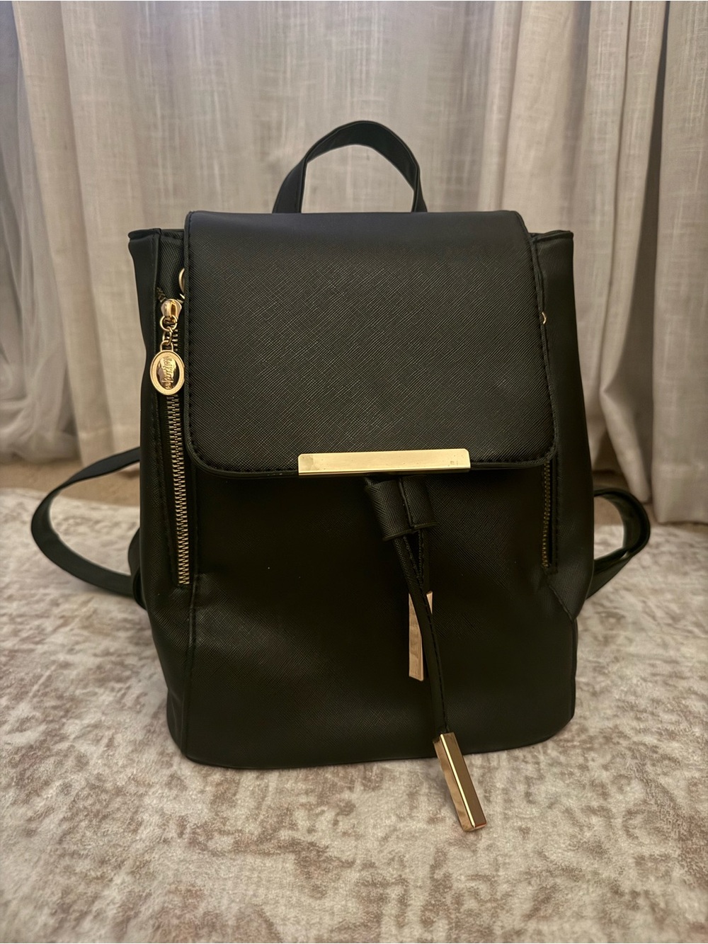 Black Leather-Texture Backpack with Gold Accents